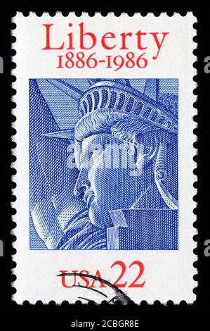 London, UK, February 5 2011 - Vintage 1986 USA cancelled postage stamp with an engraving of New York's Statue of Liberty stamp collecting stock photo Stock Photo