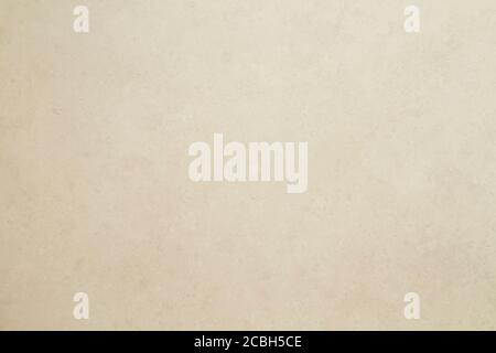Beige colored tiled wall texture or background Stock Photo