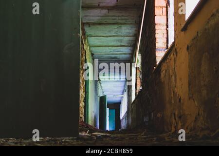Corridor in the ruined building. old abandoned house Stock Photo