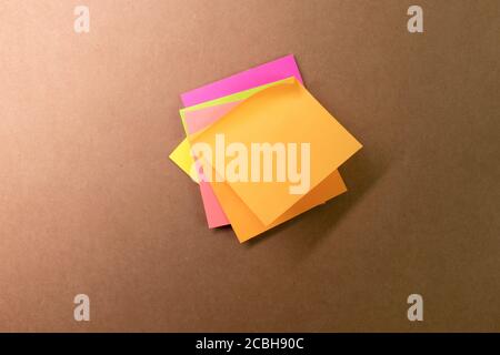 Colorful sticky notes on wall Stock Photo