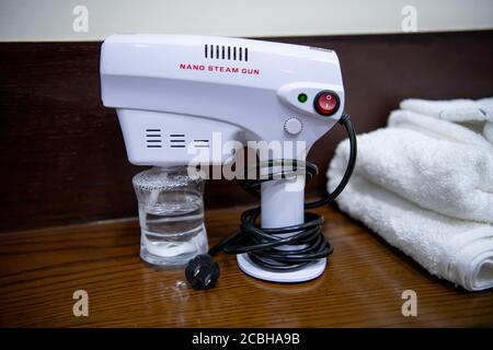 Nano Spray Gun Blue-ray Disinfectant Spray Machine suitable for Sensitization Stock Photo