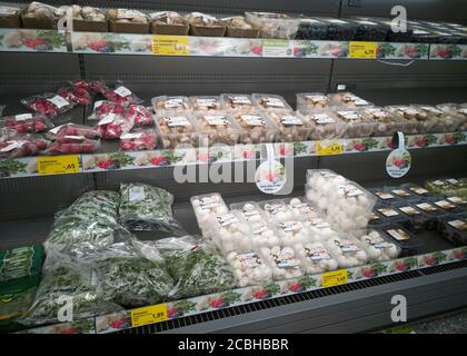 WETZLAR, GERMANY - DEZEMBER 18 2019: Aisle with mushrooms food products, interior of an ALDI SUED discount supermarket. Stock Photo