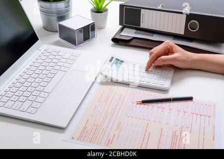 Completing Australian tax form Stock Photo