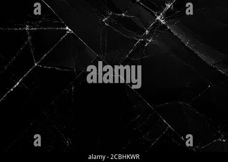 Crumpled and worn surface of dark black paper. Abstract background Stock Photo
