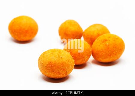 roasted chili nuts on white background Stock Photo