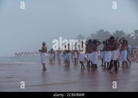 Vavu Bali is an event of paying homage to ancestors. Puja (A ritual) is performed on riverbanks and beaches on the no moon day Stock Photo