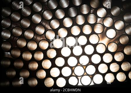 Industrial texture created using paper straws, playing with light Stock Photo