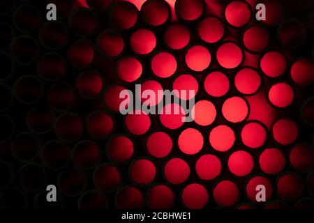 Industrial texture created using paper straws, playing with light Stock Photo