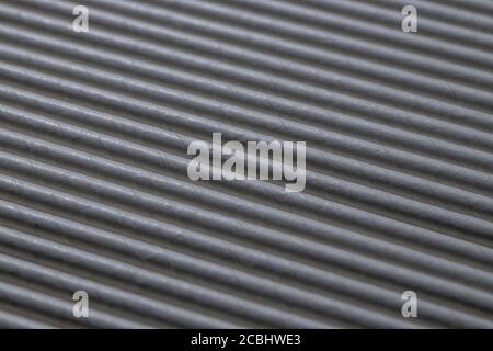Industrial texture created using paper straws, playing with light Stock Photo