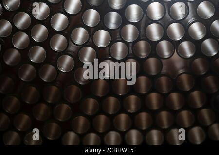 Industrial texture created using paper straws, playing with light Stock Photo