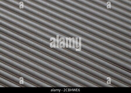 Industrial texture created using paper straws, playing with light Stock Photo