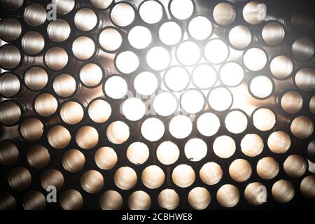Industrial texture created using paper straws, playing with light Stock Photo