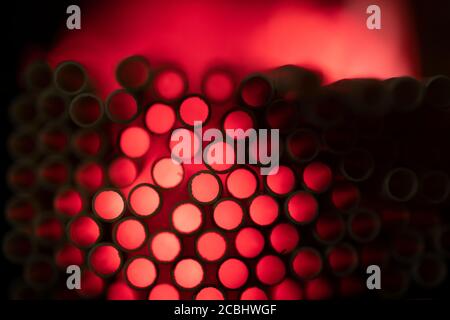 Industrial texture created using paper straws, playing with light Stock Photo