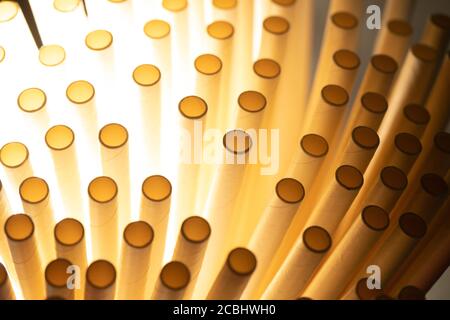 Industrial texture created using paper straws, playing with light Stock Photo