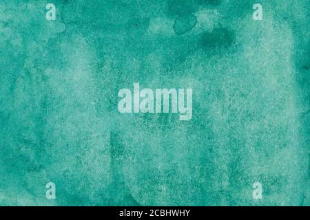 Emerald green textured background with smudges and streaks. vintage grunge design Stock Photo