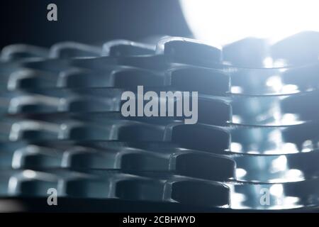 Heap of medical pills in white color. Pills in plastic package. Concept of healthcare and medicine. stock photo Stock Photo
