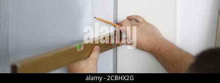 Persons hand measuring distance Stock Photo