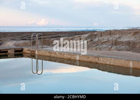 Cool refections at the Ocean Pool, Yamba, New South Wales, Australia Stock Photo