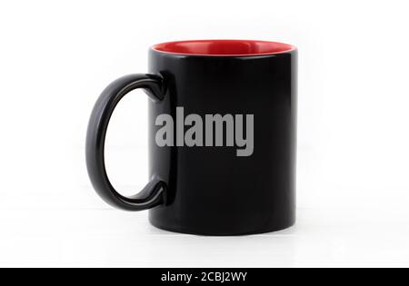 Blank black cup with red isolated on white background Stock Photo