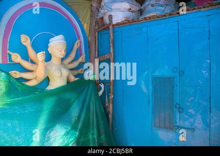 1st october 2015 kolkata west bengal india: Durga idols are being made in Kumartuli, Kolkata. The idols have been covered with plastic to protect them Stock Photo