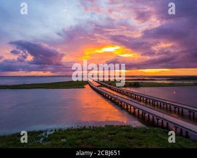 Mobile Bay and interstate 10 bridge at sunset Stock Photo