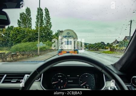 Ranger Rover driver POV when stuck behind lorry stuck at roadworks Stock Photo