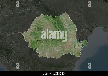 Shape of Romania separated by the desaturation of neighboring areas. Borders. Satellite imagery. 3D rendering Stock Photo