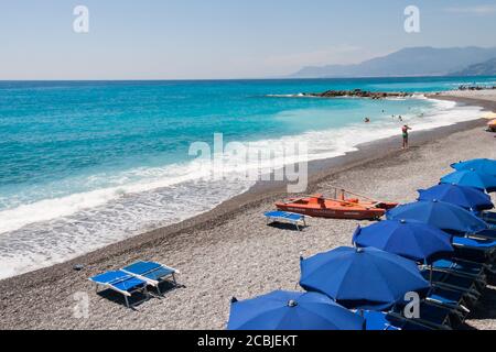 Bordighera, Liguria, Italy July 25 2015:  Scenic view of the beach and mediterranean sea in Bordighera. This is a popular tourist destination in Italy Stock Photo