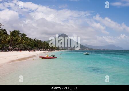 Flic en Flac, Mauritius Island, March 13 2017:  Scenic view of the sand beach and aqua water at Flic en Flac on Mauritius island. This is one of the p Stock Photo