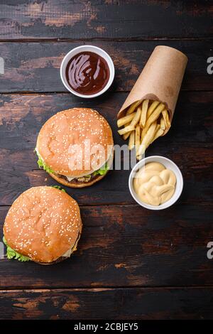 Grilled home made burger with beef on dark wooden background, topview Stock Photo