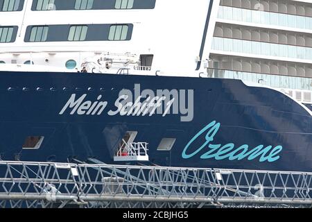 August 1st, 2020, Kiel, with Mein Schiff 1 of the shipping company TUI Cruises has moored the first cruise ship after the outbreak of the corona pandemic in the port of Kiel at the Ostseekai. Detail of the bow with the ship's name. | usage worldwide Stock Photo
