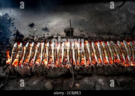 The image of fresh fish of fishermen grilled on embers for sale at the market at Dien Van grilled fish village, Nghe An province, Vietnam Stock Photo