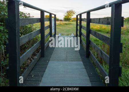 wooden bridge footpath over beach and sand dunes at Lowestoft Suffolk Stock Photo