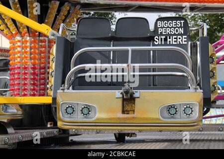 The Seats of a Spinning Fun Fair Amusement Ride. Stock Photo