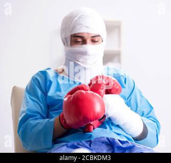 The injured boxer recovering in hospital Stock Photo