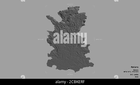 Area of Matara, district of Sri Lanka, isolated on a solid background in a georeferenced bounding box. Labels. Bilevel elevation map. 3D rendering Stock Photo