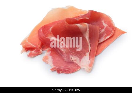 Studio shot of sliced prosciutto cut out against a white background - John Gollop Stock Photo