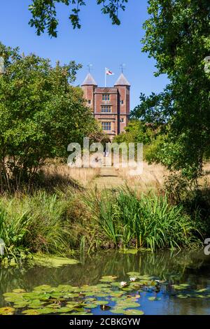 The Elizabethan Tower at Sissinghurst Castle from the moat in summer, Kent, England Stock Photo