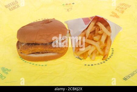 McDonald’s McChicken Chicken Sandwich with french fries or chips on wrapper Stock Photo