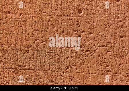 Textured stone background in warm tone. Horizontal copyspace Stock Photo