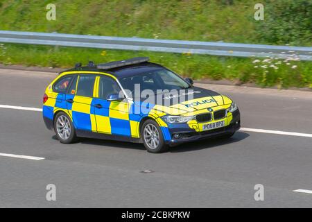 2018 BMW X5 Xdrive30D AC Auto; Tac ops, Tactical Operations division. UK Police Vehicular traffic, transport, modern, saloon cars, north-bound on the 3 lane M6 motorway highway. Stock Photo
