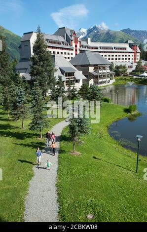 Grandparents and grandchildren on lakeside path at Alyeska resort, Girdwood, Alaska, USA Stock Photo