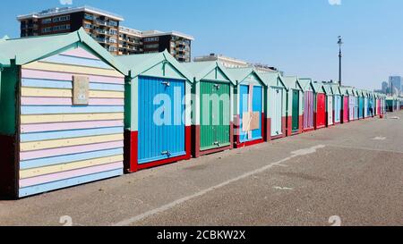 Brighton and Hove, E Sussex, UK - August 2020: Colourful brach huts on the prom at Hove. Stock Photo