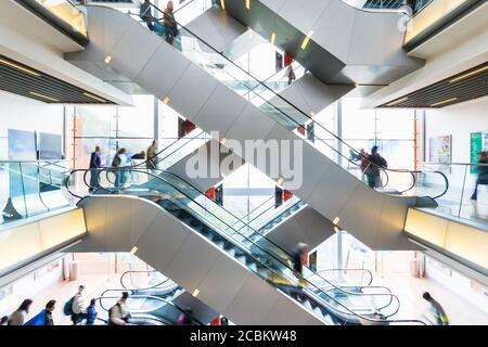 Escalators in shopping mall, Hong Kong Stock Photo