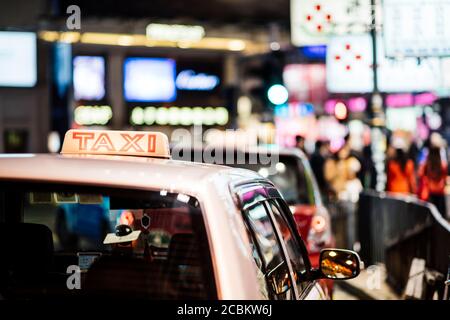 Taxis waiting in the street, Causeway Bay, Hong Kong, China Stock Photo