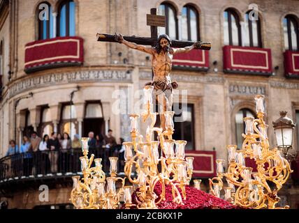 Penitents of La Sed (The Thirst) Brotherhood taking part in processions during Semana Santa (Holy Week), Seville, Andalucia, Spain Stock Photo