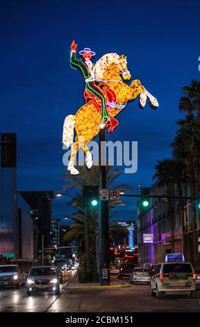 Neon signs in centre of road, downtown Las Vegas, Nevada, USA Stock Photo