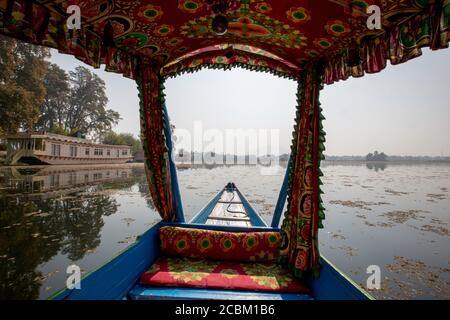 Shikara or Love Boat iconic to Lake Dal, Srinagar, Jammu and Kashmir, India Stock Photo