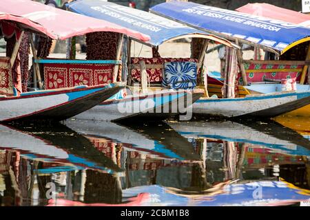 Shikara or Love Boat iconic to Lake Dal, Srinagar, Jammu and Kashmir, India Stock Photo