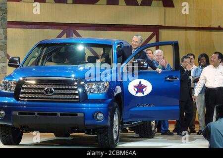 San Antonio, Texas November 17, 2006: Toyota Motor Company CEO Katsuaki Watanabe climbs into the first vehicle off the assembly line after the opening of the Toyota Tundra assembly plant in south Bexar County on Friday. The $1.28-billion facility employs about 1,800 workers. ©Bob Daemmrich Stock Photo